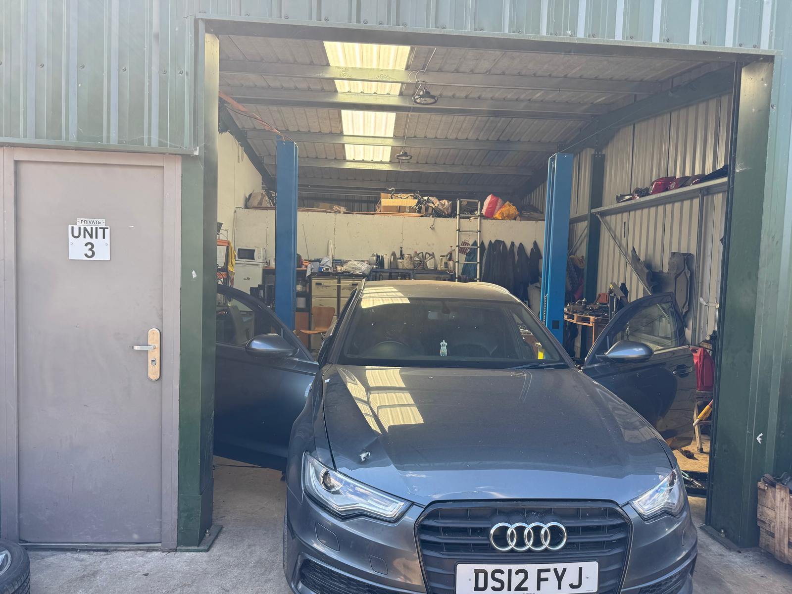 The Godstone Cars workshop, Unit 3, with an Audi in the bay